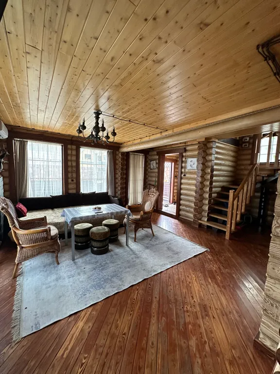 Дом из бруса на берегу моря с зоной барбекю и собственной парной