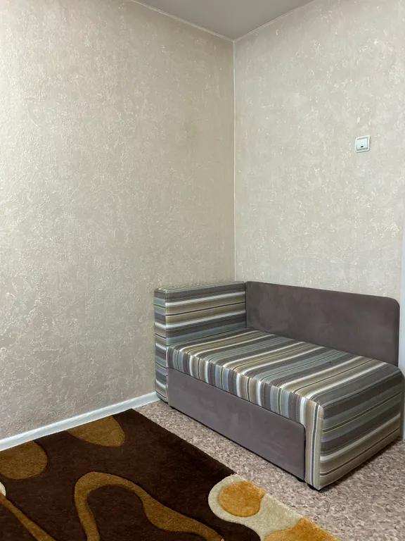 Уютная двухкомнатная квартира в тихом районе с дизайнерским ремонтом