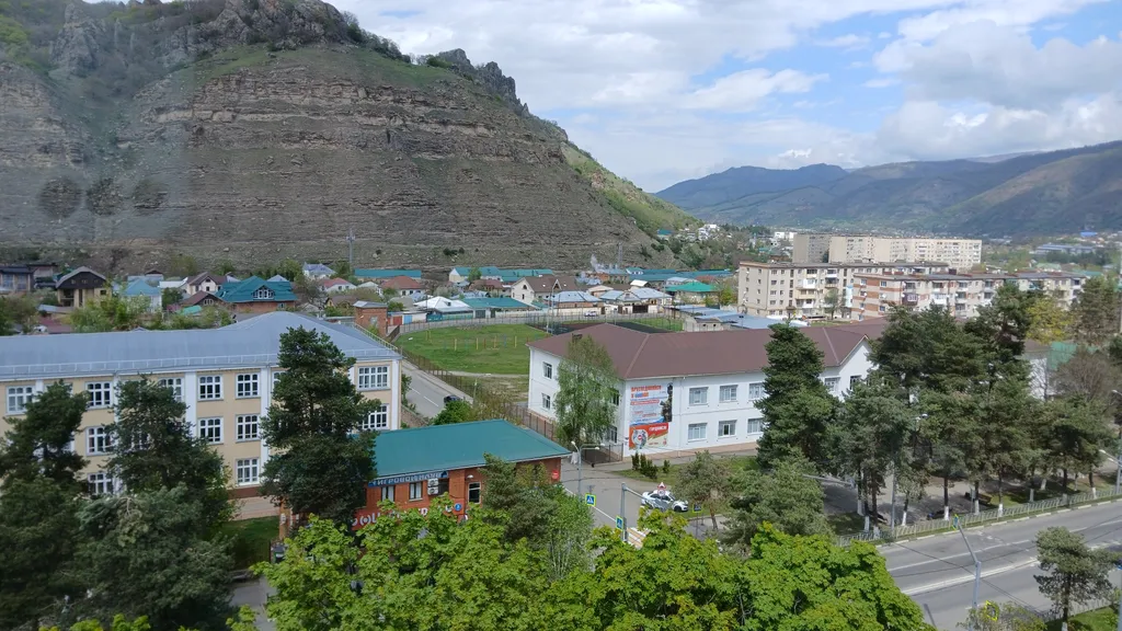 "Квартира в центре города с видом на горы"