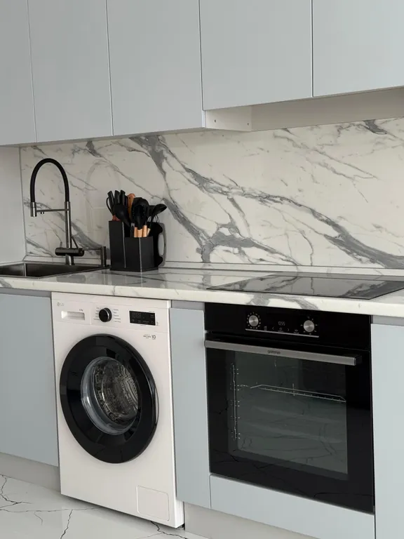 Уютная квартира в центре города рядом с фонтаном, с видом на город