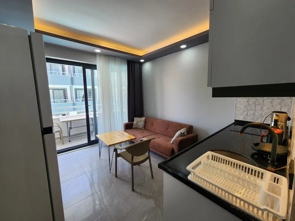 Квартира в центре Сиде внутри комплекса с бассейном