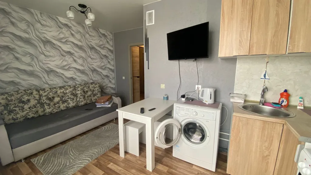 Квартира Уютная квартира студия на высоком этаже — Новосибирск