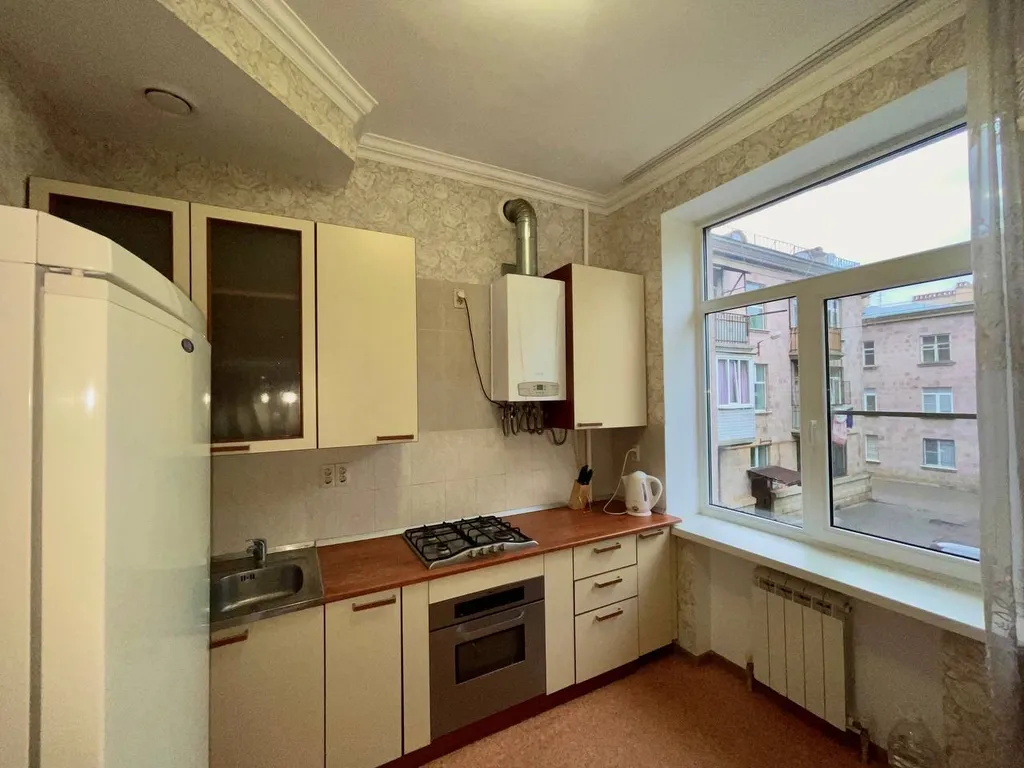 Уютная квартира в центре города в туфовом доме