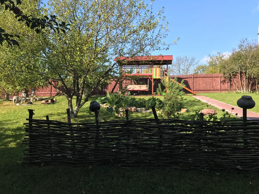 Дом из бревна Терем с сауной в черте города