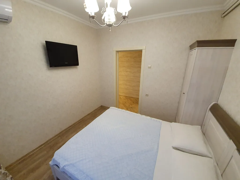 Стильный трехкомнатный дом с отдельной террасой