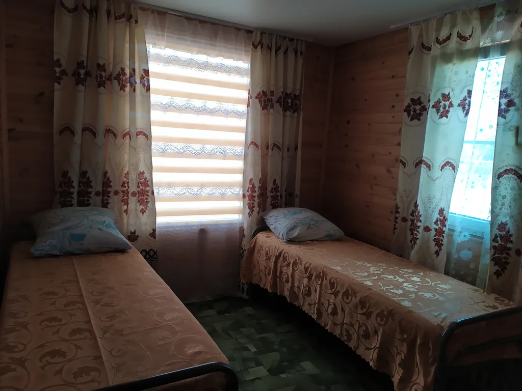 Уютный двух комнатный номер для четырёх гостей