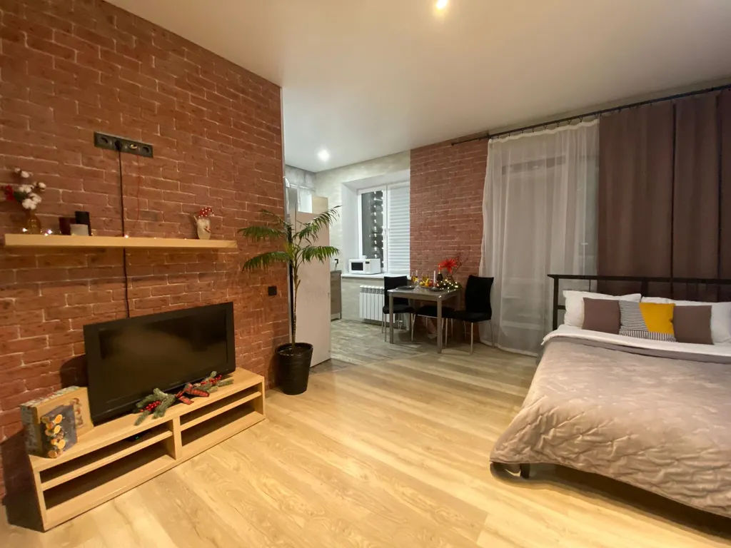 Квартира Хэппи Хаус Студия в стиле лофт в Кузьминках — Омск