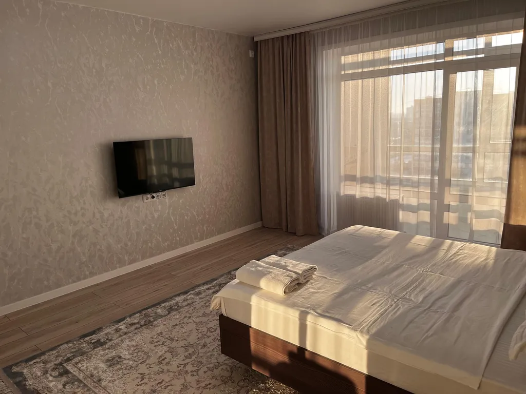 Новая квартира в новом ЖК Панорама с панорамным видом из окна на город — аренда посуточно в Костанай