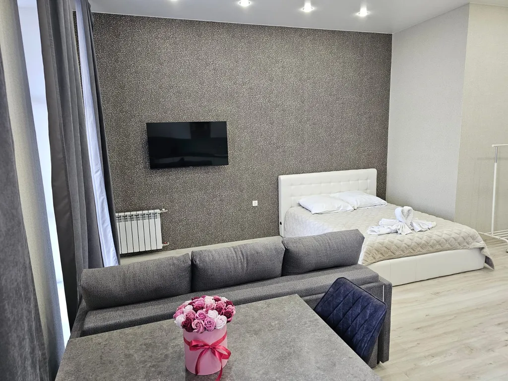 Квартира Уютная студия в центре города — Омск