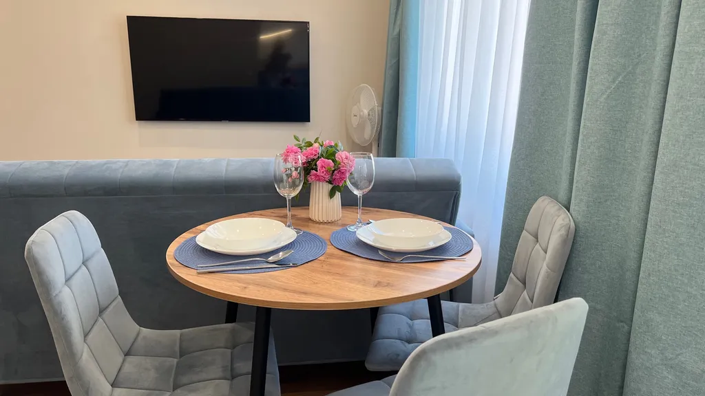 Апартамент у часовой башни и дома гильдии