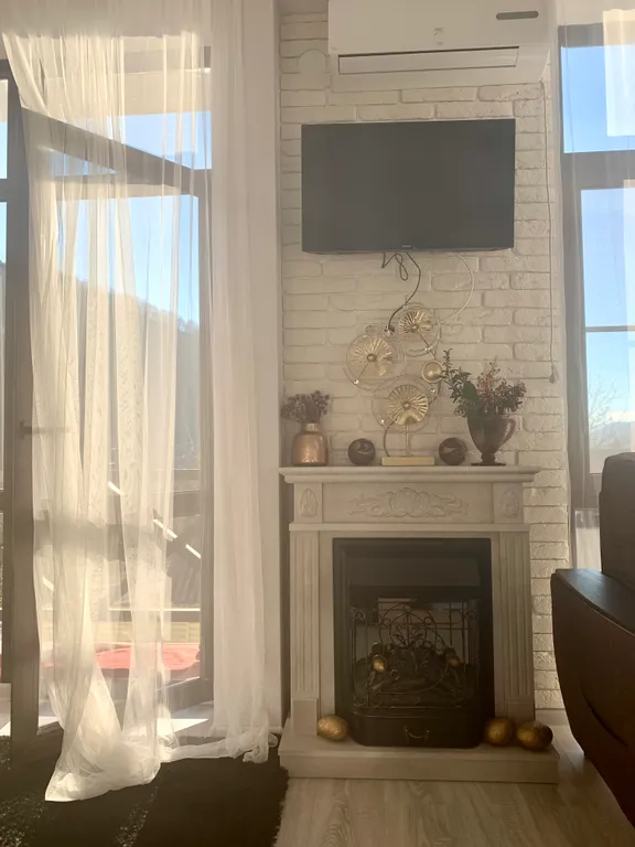 Солнечная стильная студия в горах Красной Поляны