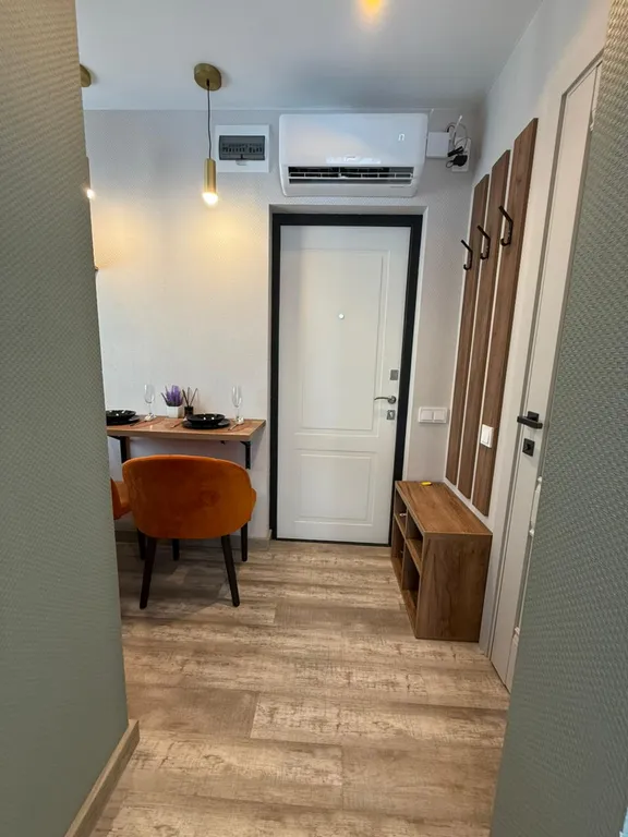 Уютная и стильная студия с отдельной кухней