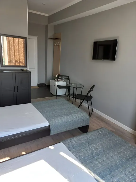 Двухместный номер с 2 односпальными кроватями и панорамным окном