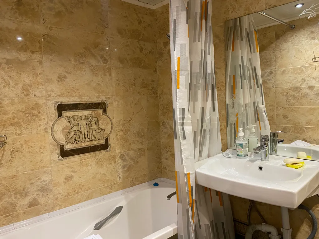 Квартира у сквера