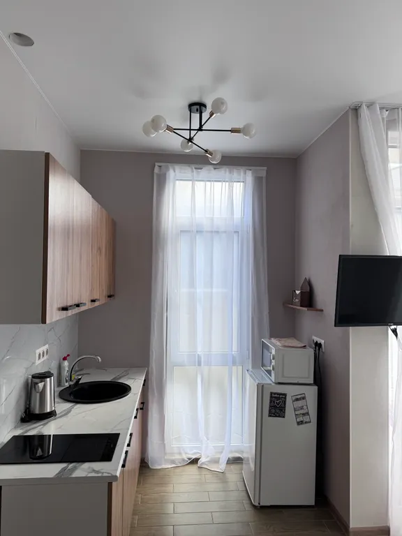 Квартира Квартира Уютная семейная студия — Сириус