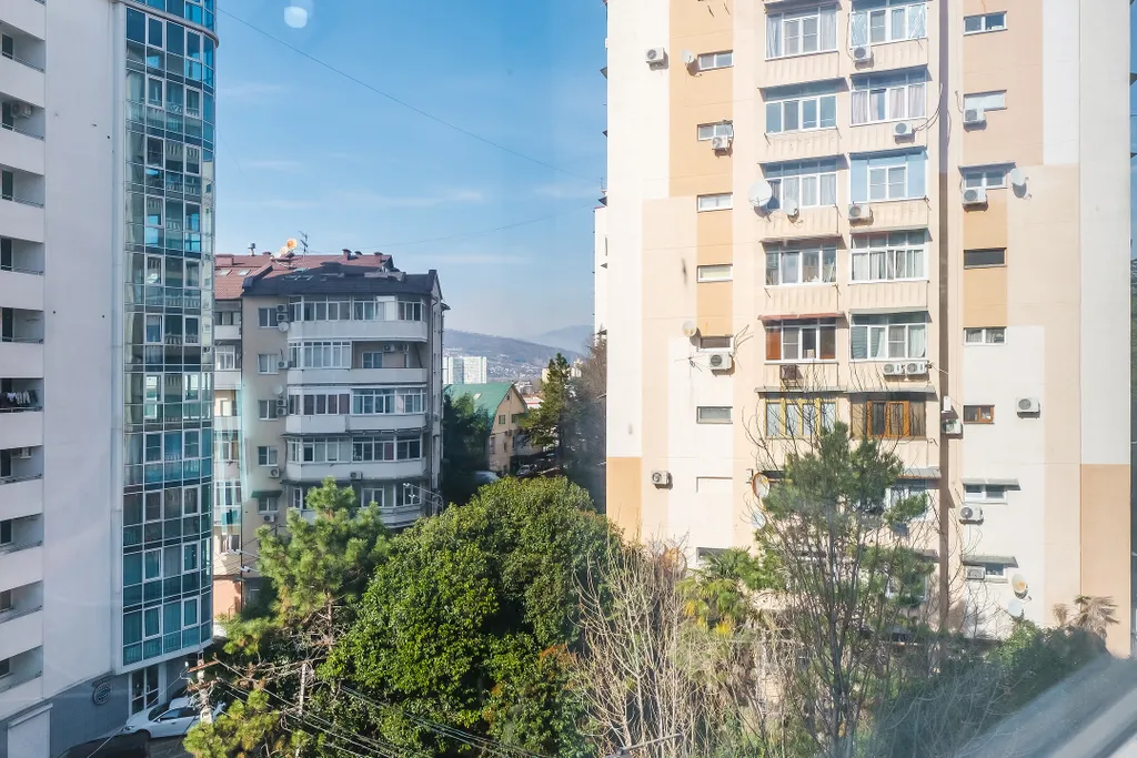 Квартира Квартира Современная студия с панорамными окнами в центре города — Сочи
