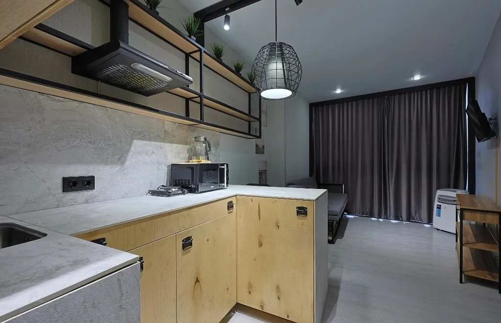 Уютная студия с панорамным окном