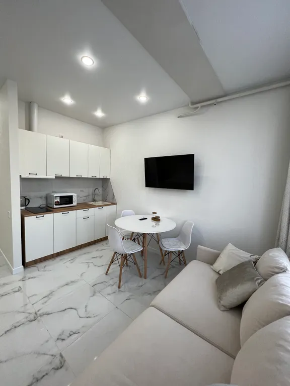 Квартира Квартира Уютная студия с балконом — Сириус