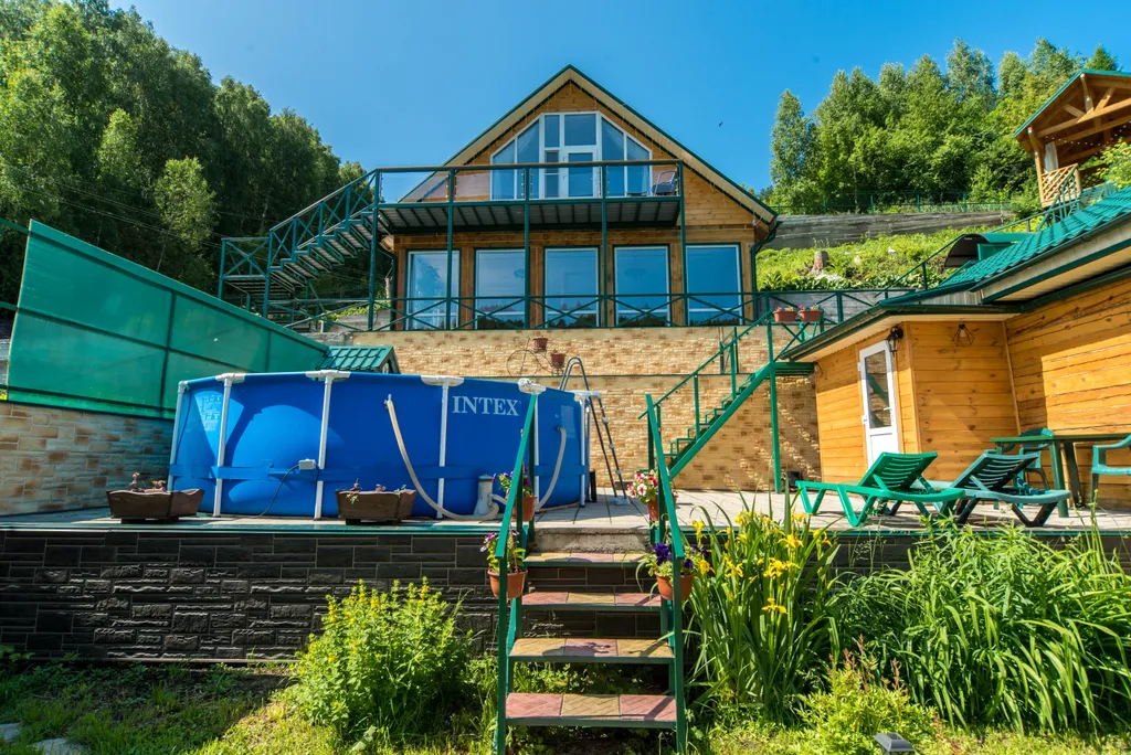 Апартаменты Романтика с панорамным окном в мансарде дома