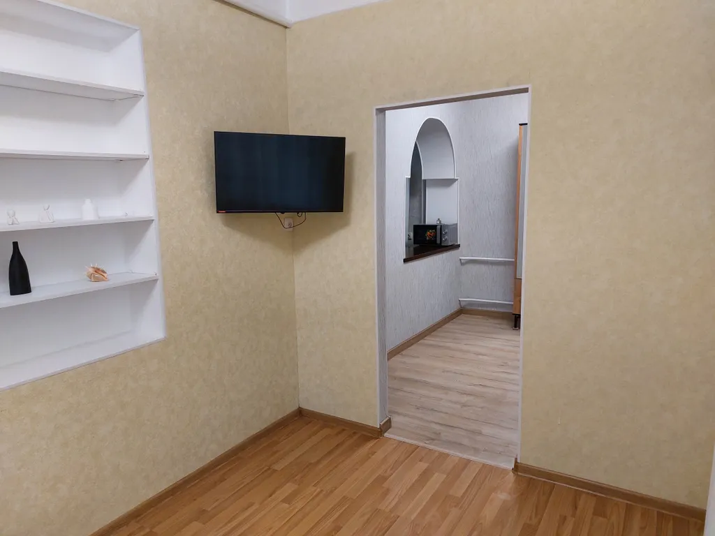 Уютный дом в центре города с местом для парковки автомобиля