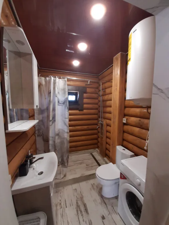 Семейные апартаменты Балдино в доме из сруба