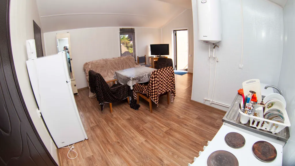 Коттедж Коттедж Уютные апартаменты с 2-мя спальнями — Ейск