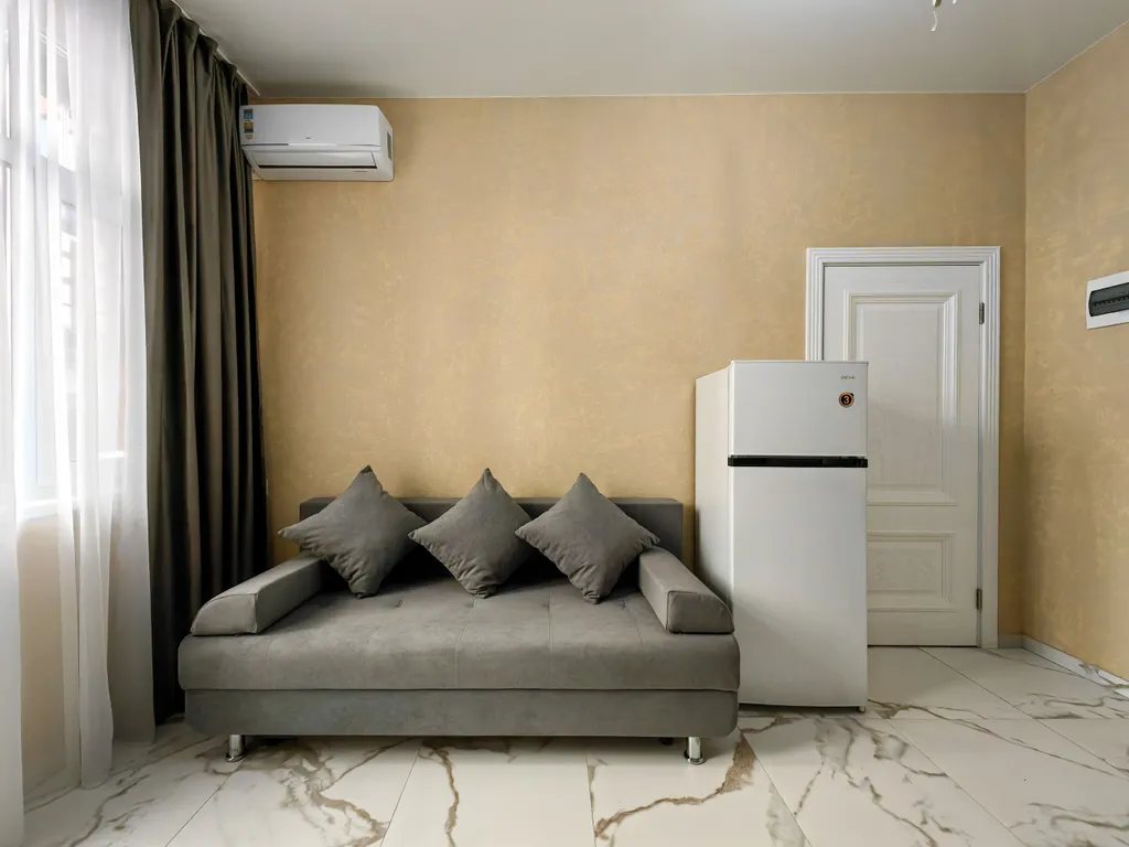 Апартаменты с отдельной спальней и кухней - гостиной