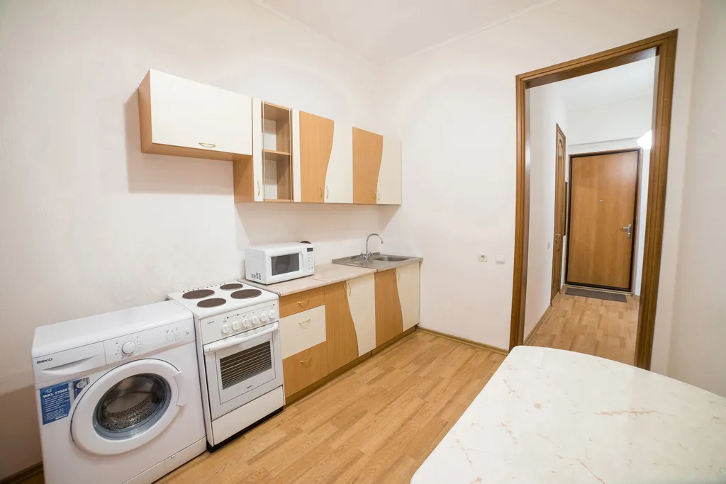 Светлая квартира в элитном доме с парковкой в самом центре