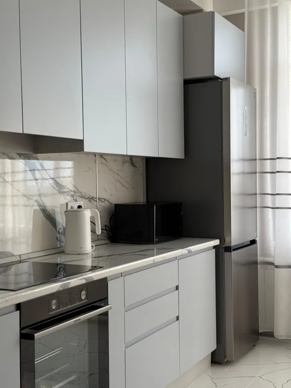 Уютная квартира в центре города рядом с фонтаном, с видом на город