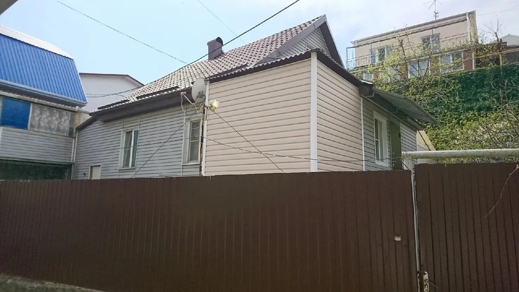 Дом с участком в центре города