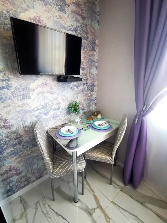 Уютная студия с боковым видом на море