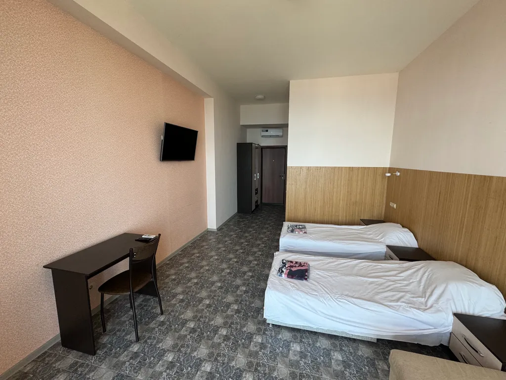 Четырехместный Люкс с балконом и видом на море