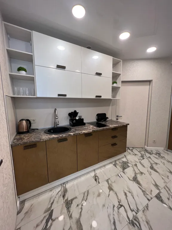 Студия с дизайнерским ремонтом