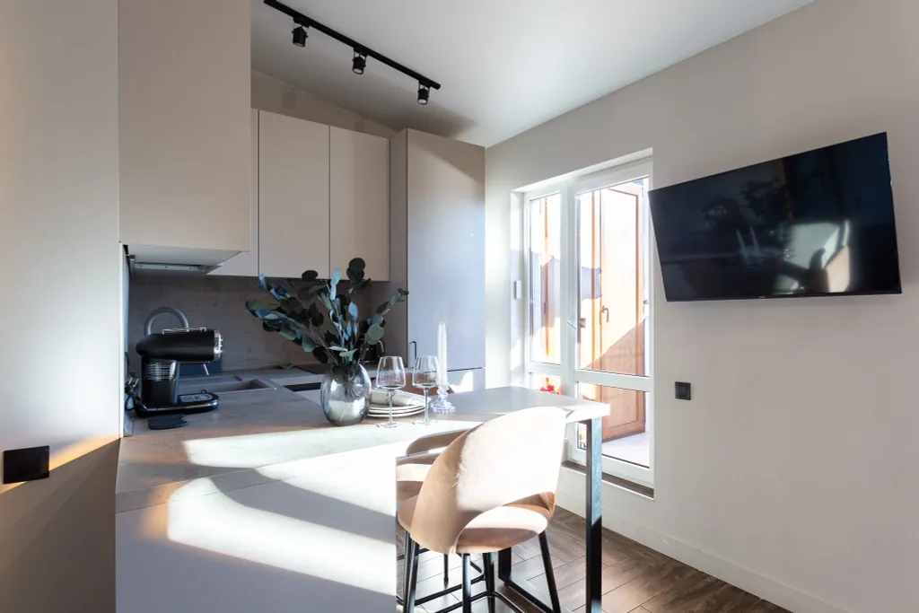 Стильная студия Кватро 152 с террасой и кофемашиной