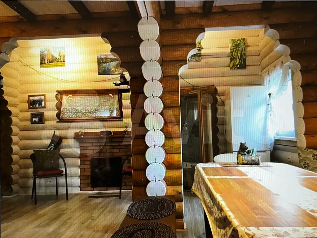 Дом из бревна Терем с сауной в черте города