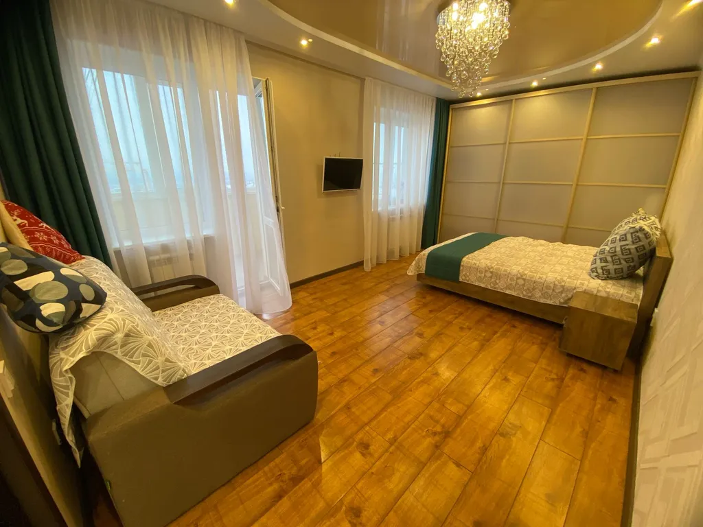 Уютная квартиpa в центрe города с прекрасным вечерним видом на город