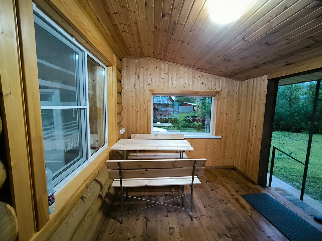 Новый бревенчатый дом в центре