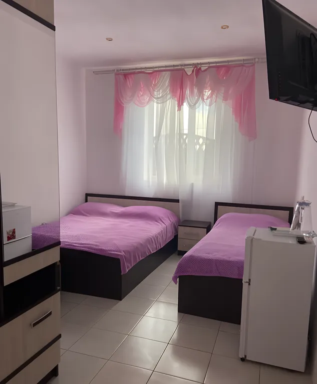 Квартира Четырехместный номер с 3 отдельными кроватями — аренда посуточно в Феодосия