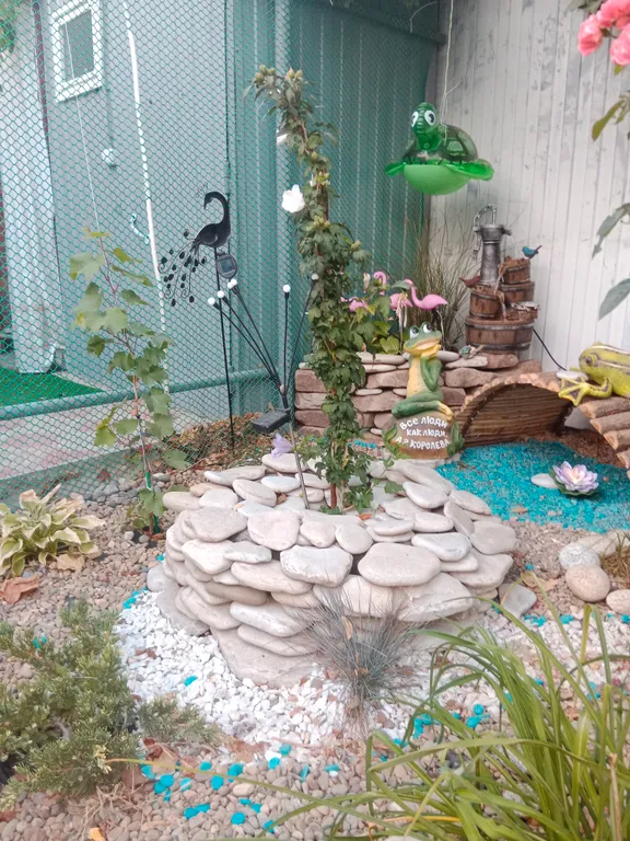 Уютная комната-студия в центре города с цветущим двориком с фонтанчиками