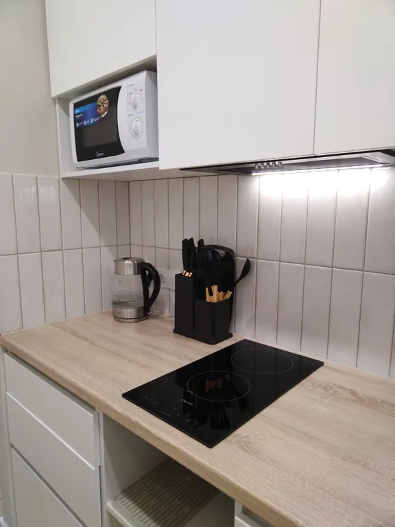 Уютная студия в новом доме с современным ремонтом