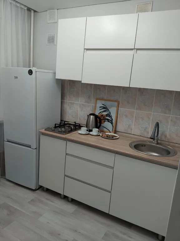 Квартира с видом на ели