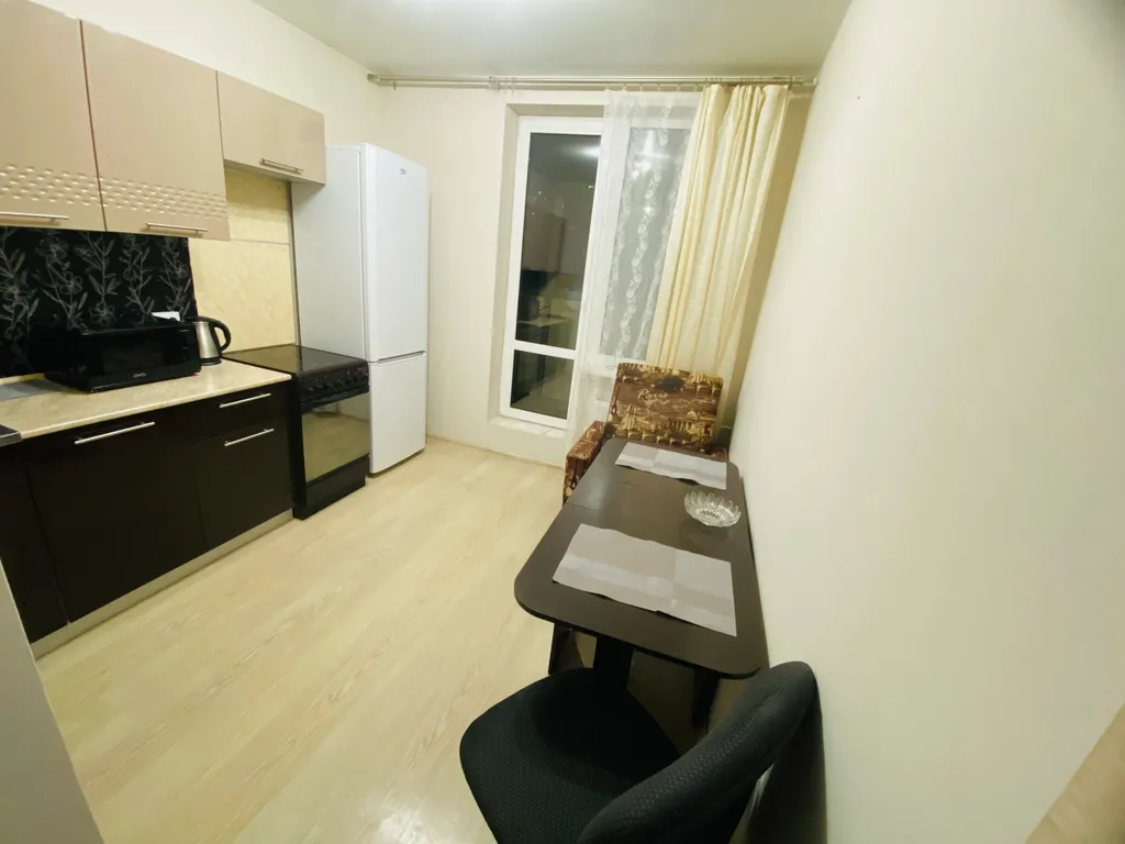 Уютная квартира с прекрасным видом на город в огнях