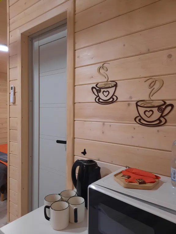 Уютный четырехместный Домик де-люкс с двухспальной кроватью