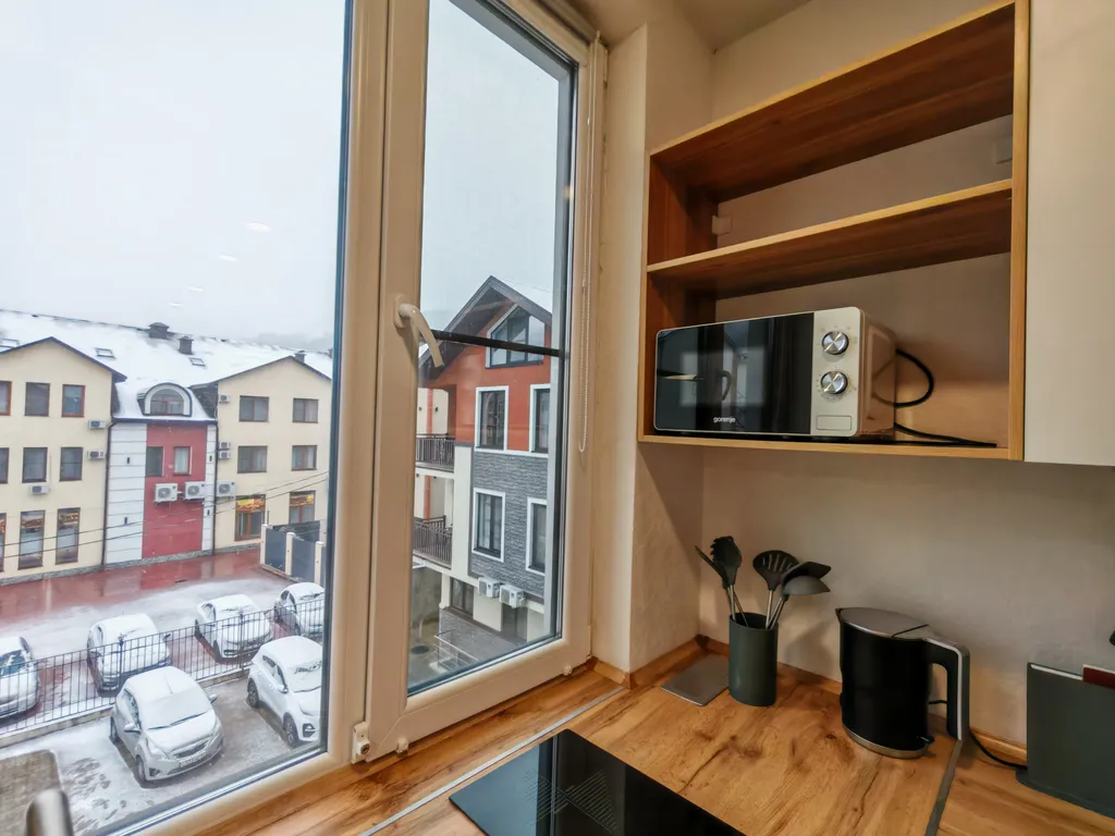 Уютная квартира-студия в центре горнолыжного курорта Красная поляна