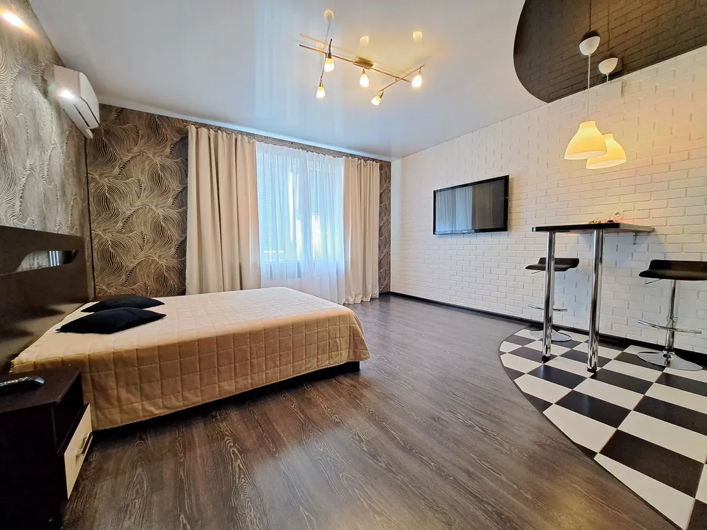 Студия с кондиционером на 14 этаже с видом на стадион