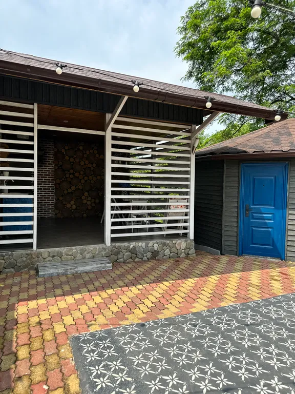 Загородный дом с бассейном и сауной