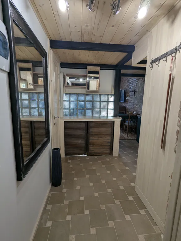 Уютная двухуровневая квартира-студия в доме XIX века