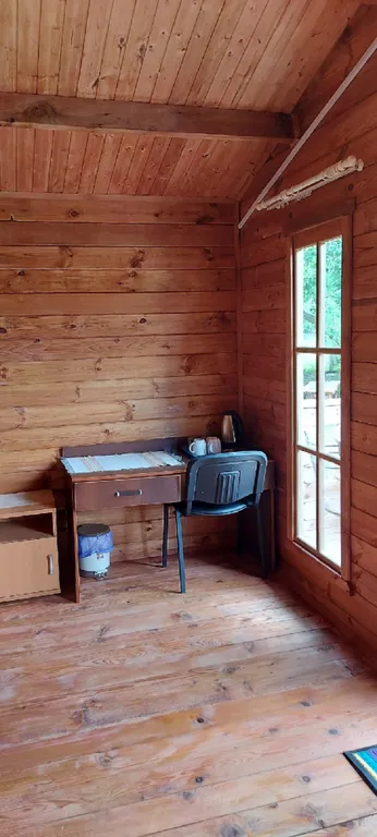 Дом в деревне на берегу реки для спокойного отдыха