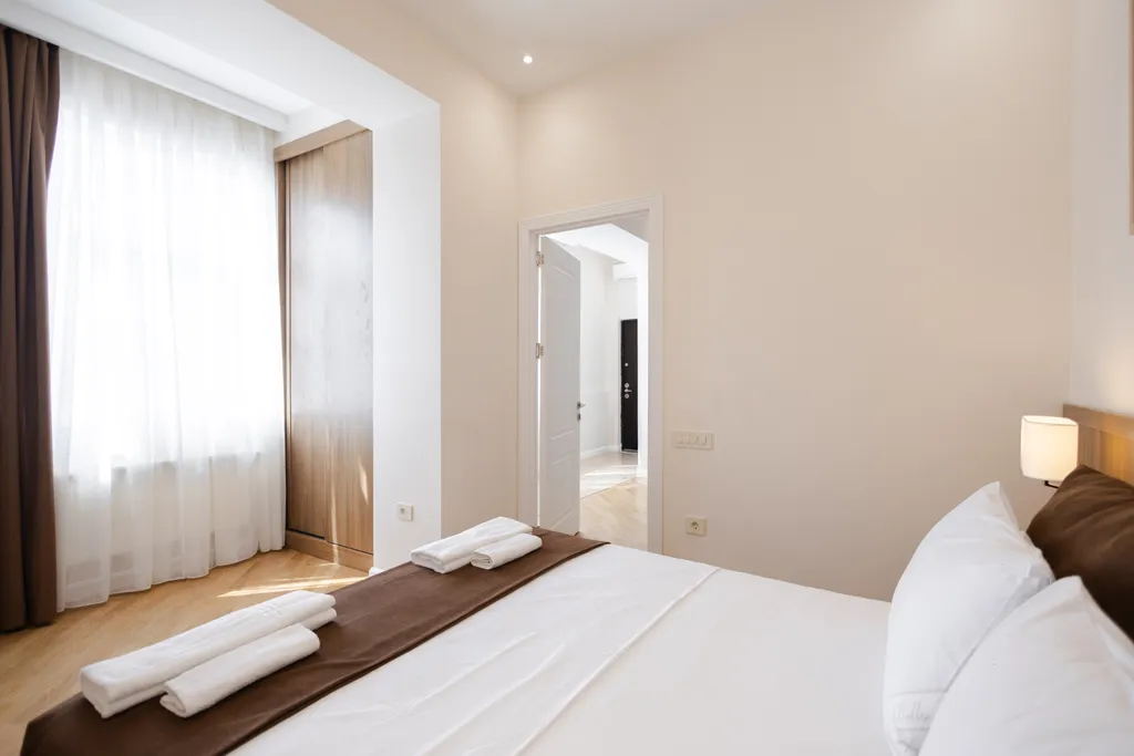 Современная квартира с двумя спальнями и новым ремонтом в центре