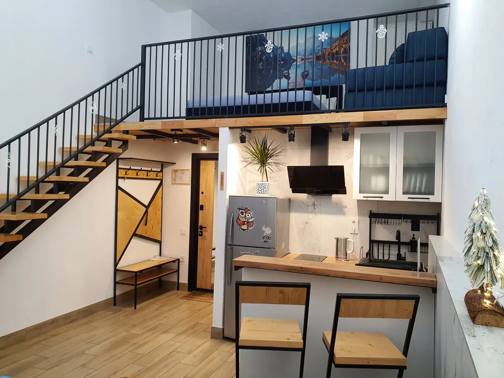 Комфортный двухуровневый апартамент в элитном комплексе Колизей